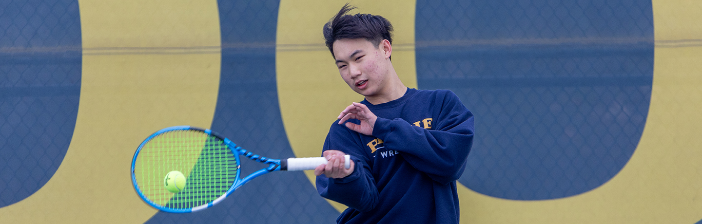 Tennis Player Aims A Forehand Shot