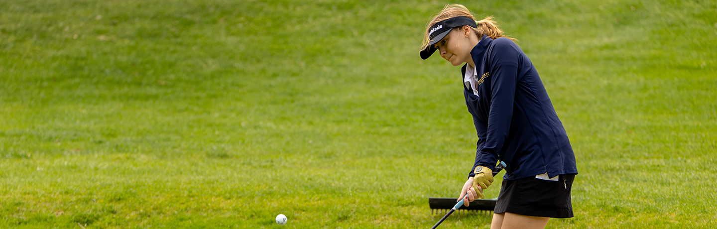 A Golfer Aims A Shot