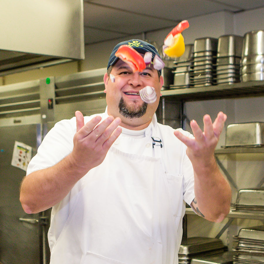 Executive Chef Jeremy Stahl has fun while preparing vegetables for students and employees of Peddie.