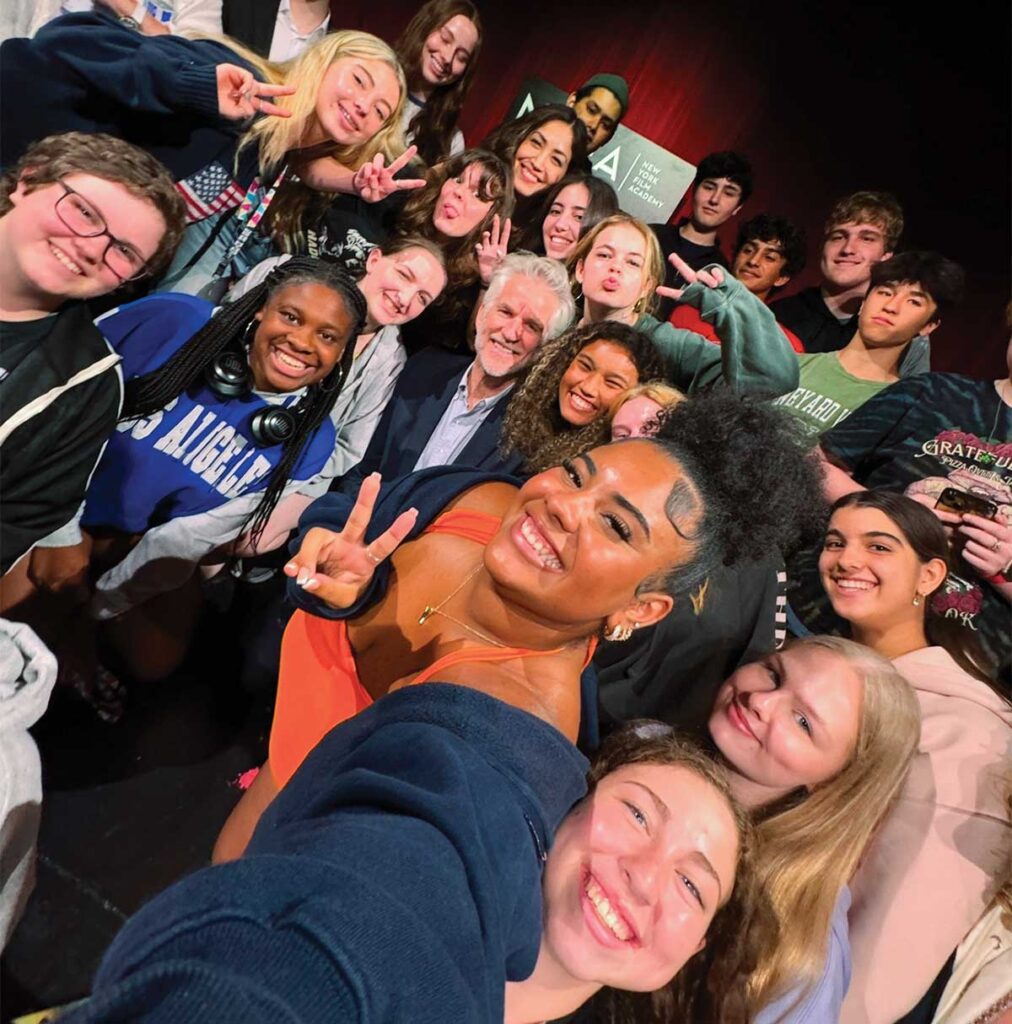 Yanelly DeLeon ’25 (center, holding camera) and her classmates at the New York Film Academy meet actor Matthew Modine.