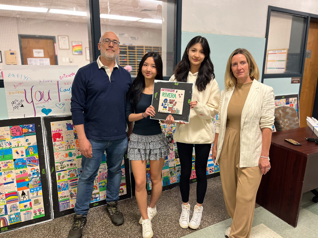 Mark Cirnigliaro, Elaine Liu ’26, Sylvania Peng ’26 and Principal of Luis Muñoz-Rivera Elementary School, Dr. Olivia Russo