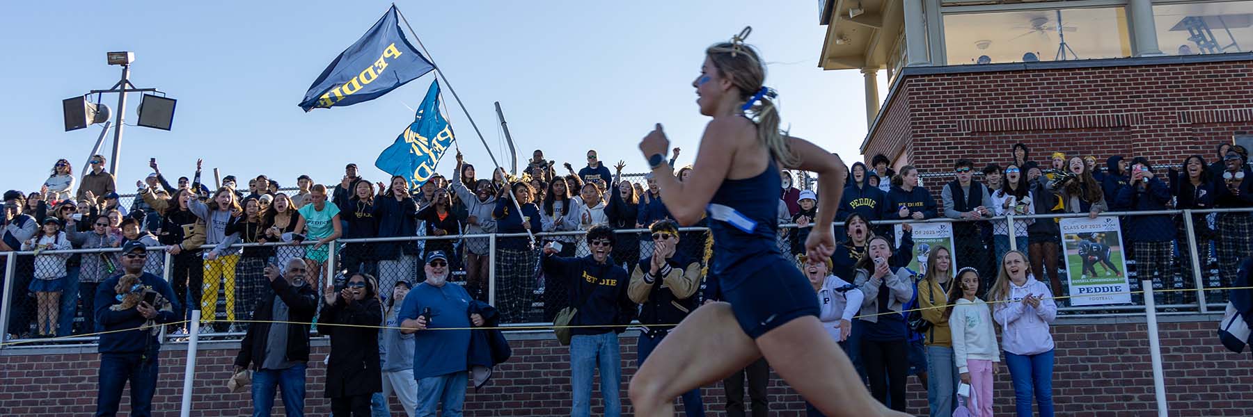 The Peddie home crowd cheers for the cross country team at Peddie-Blair Day 2025