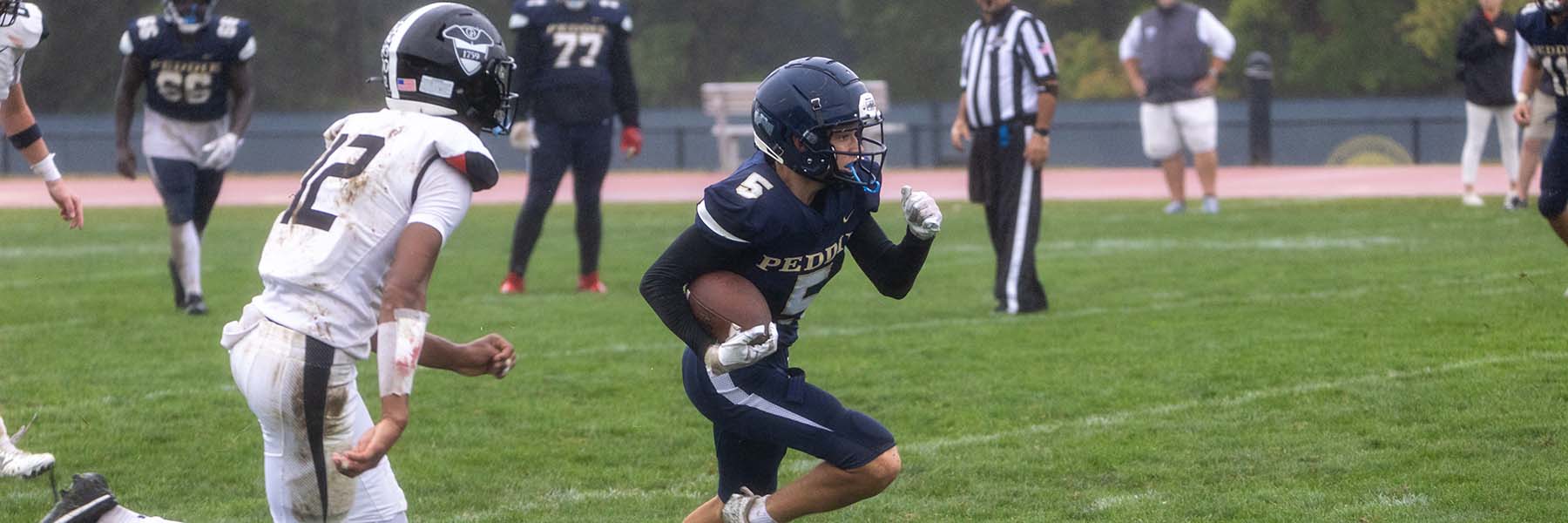 Lorenzo Barone runs with the football
