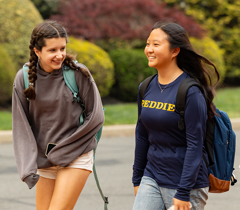 two girls walking