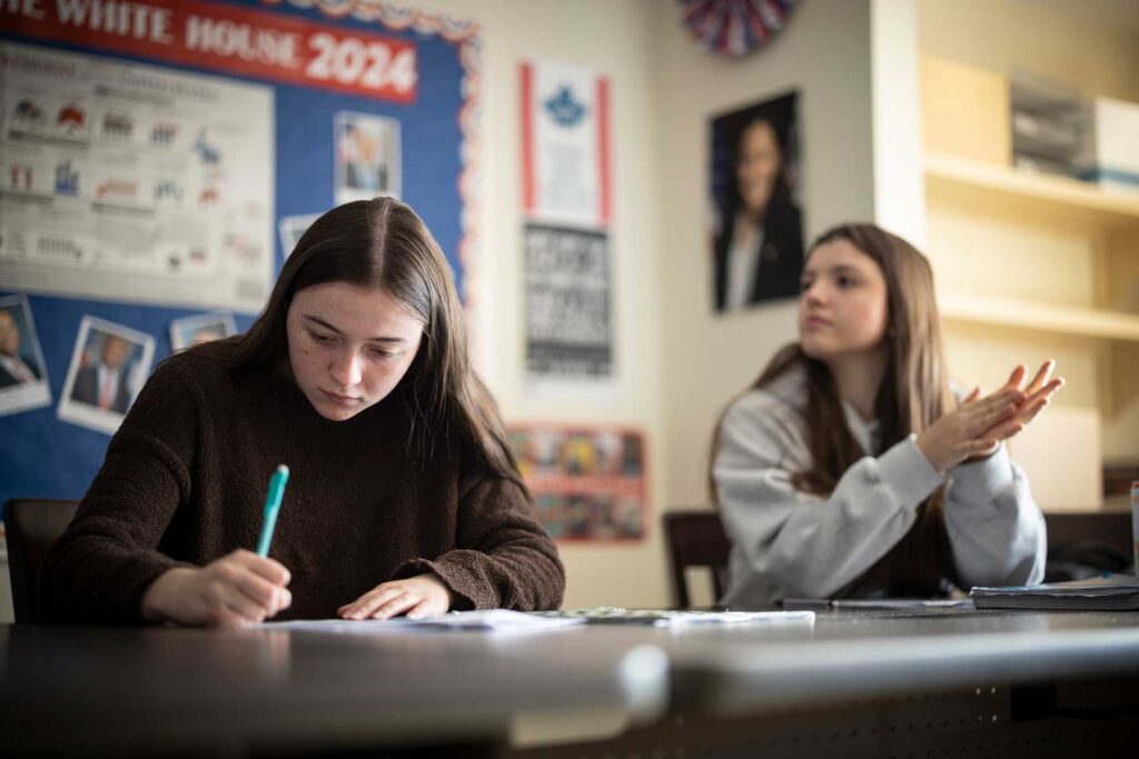 students learning in history class