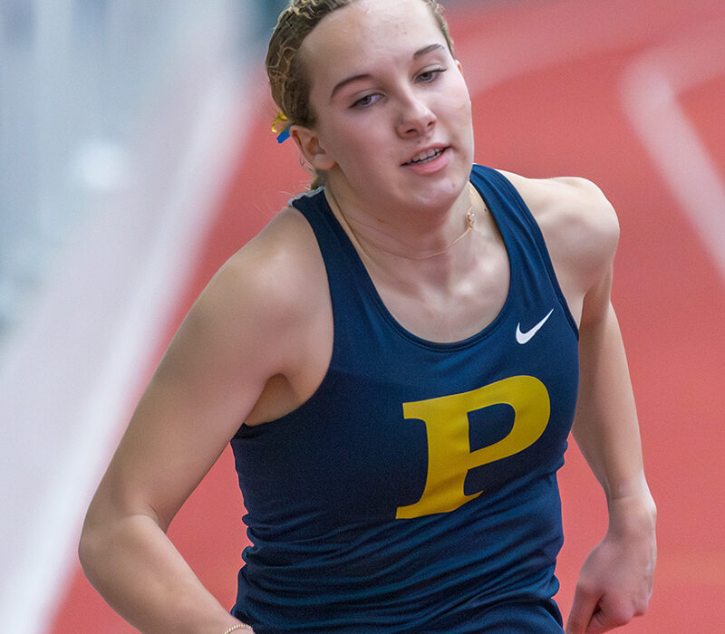 Tessa Hughes Breaks 15th School Record