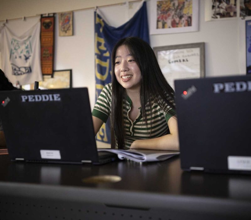Student with Laptop in Classroom at Peddie